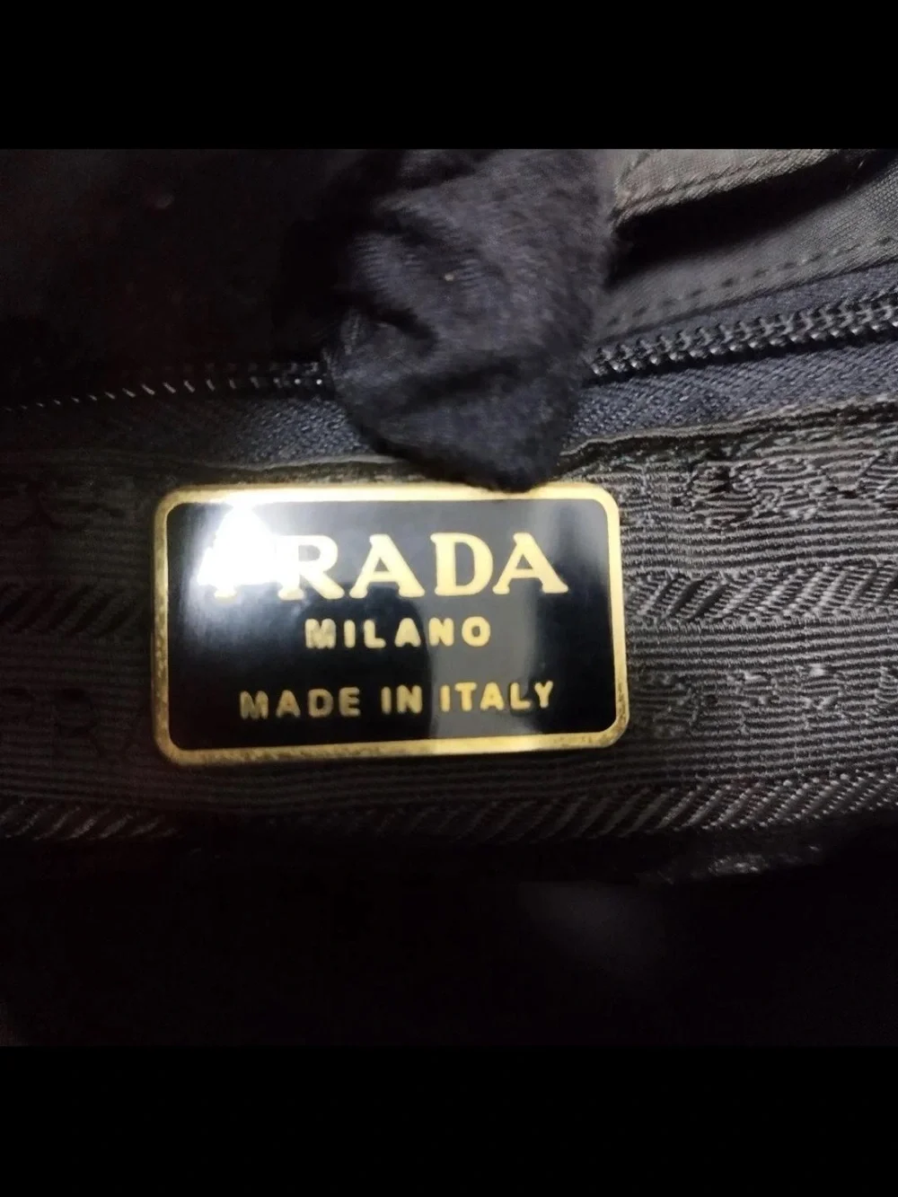 Prada Black Quilted Nylon Drawstring Backpack with Gold Hardware